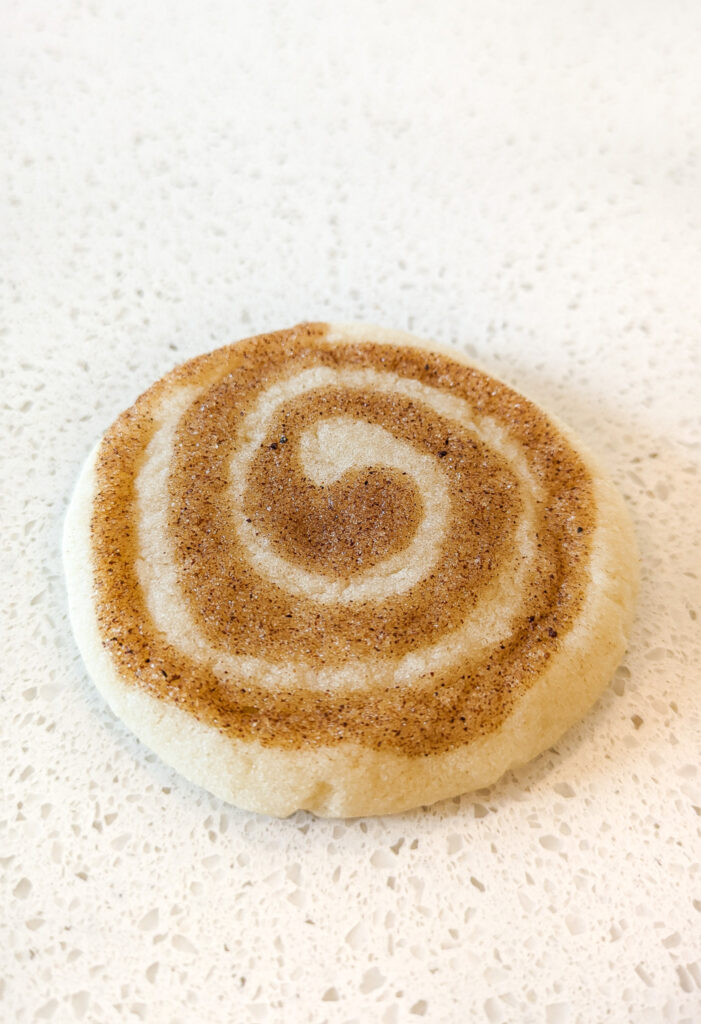 Close up of cinnamon swirl on cookie.